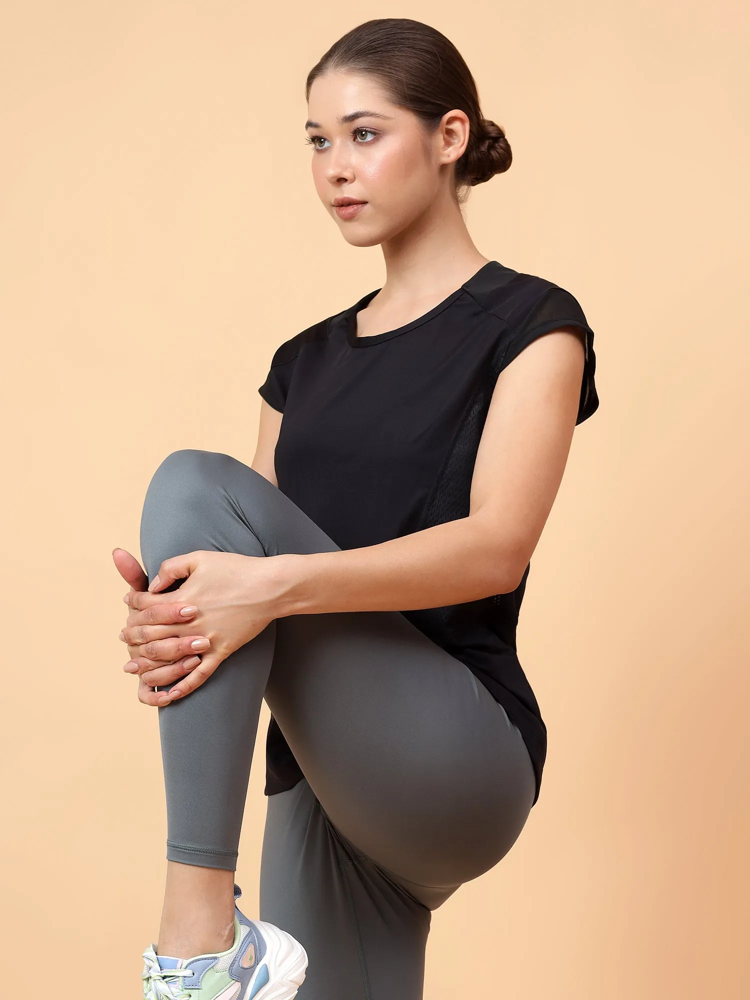Fitkin Women's Black Solid Side Mesh Training Top